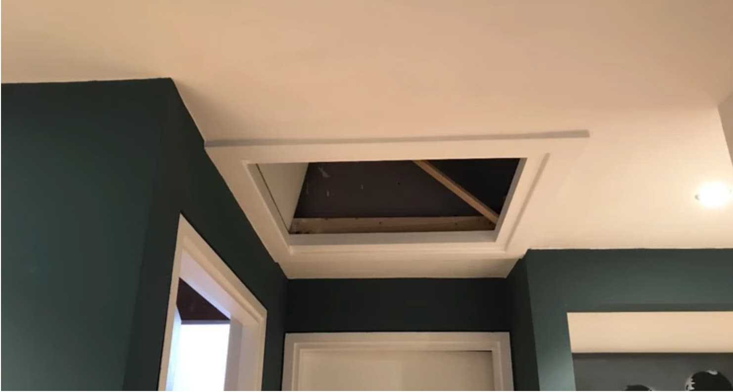 open hatch built into a ceiling