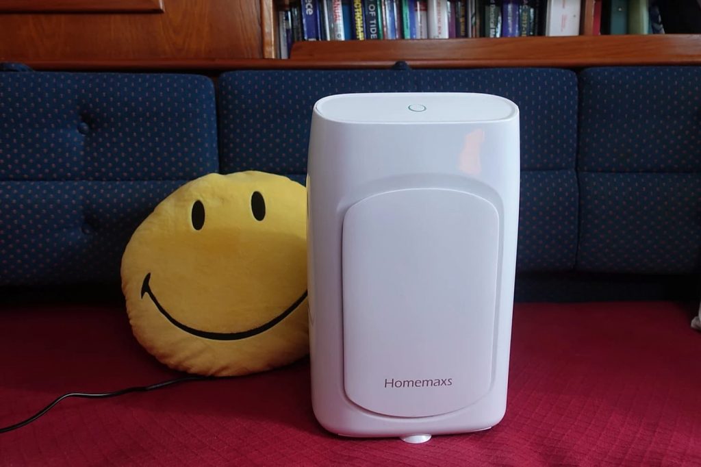 dehumidifier with a smiley face cushion