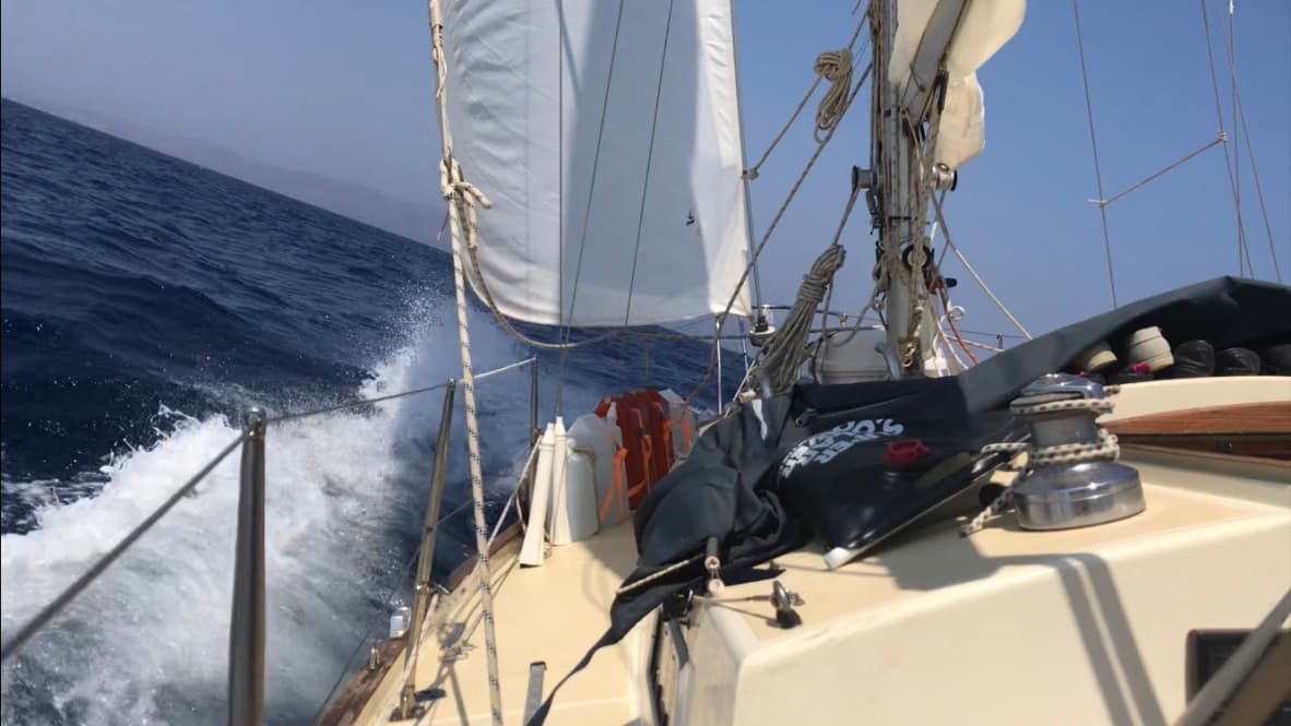 view of genoa from cockpit of victoria 34 beating