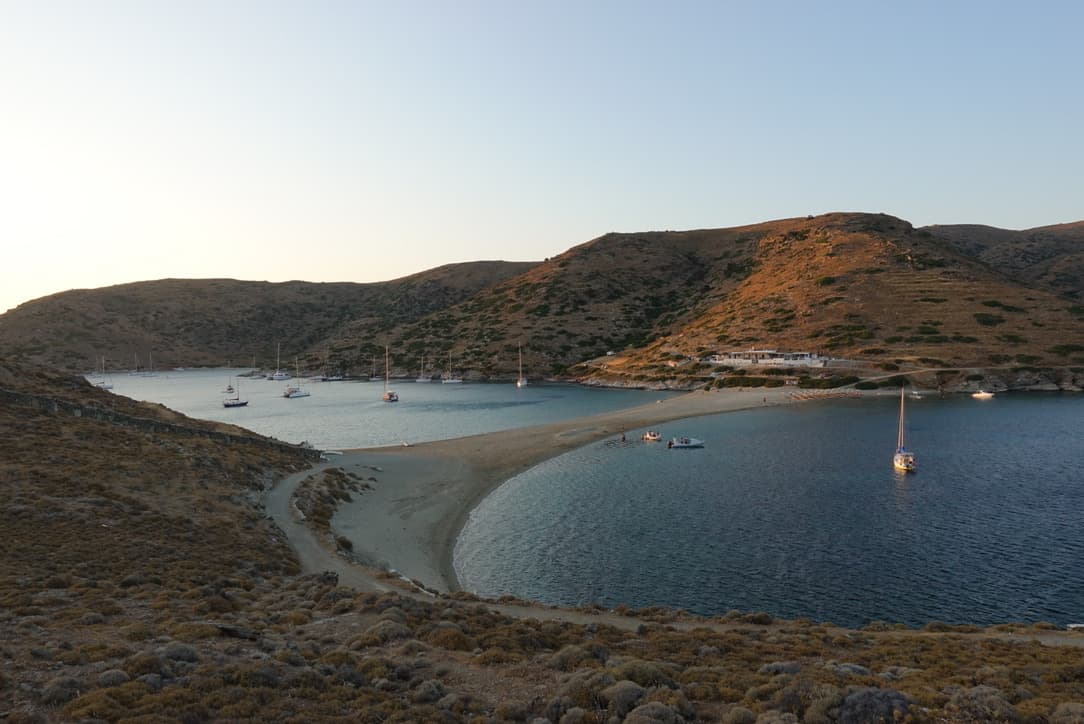 view of bay with anchored boats in greece