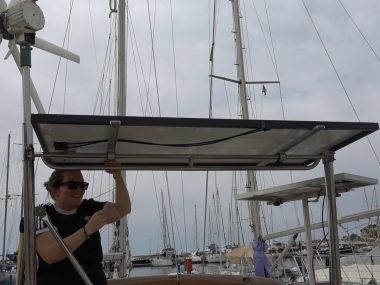 solar panel installation on a sailboat steel arch
