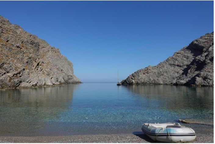 sailing boat anchored off amorgos greece